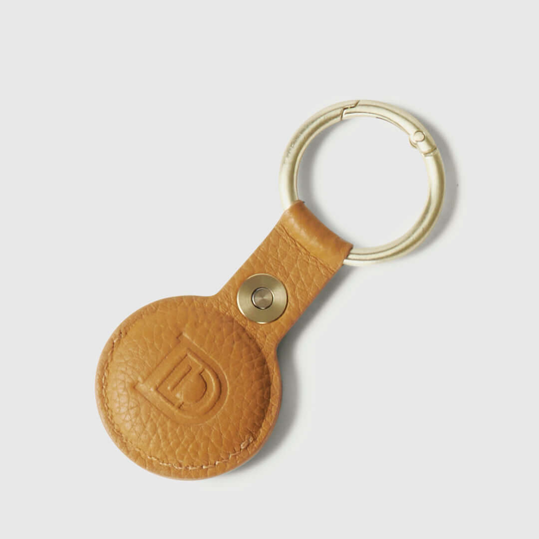 DOGLOC Leather Keychain front view with debossed logo